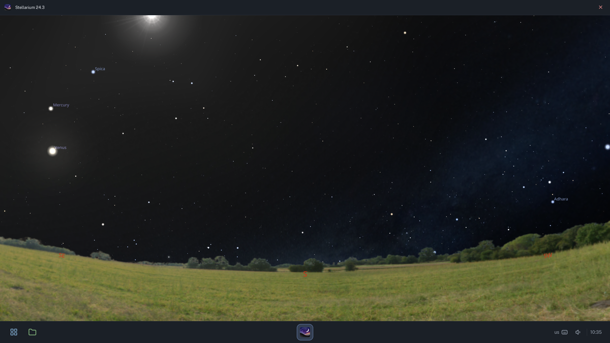 Stellarium showing a starry sky above a field.