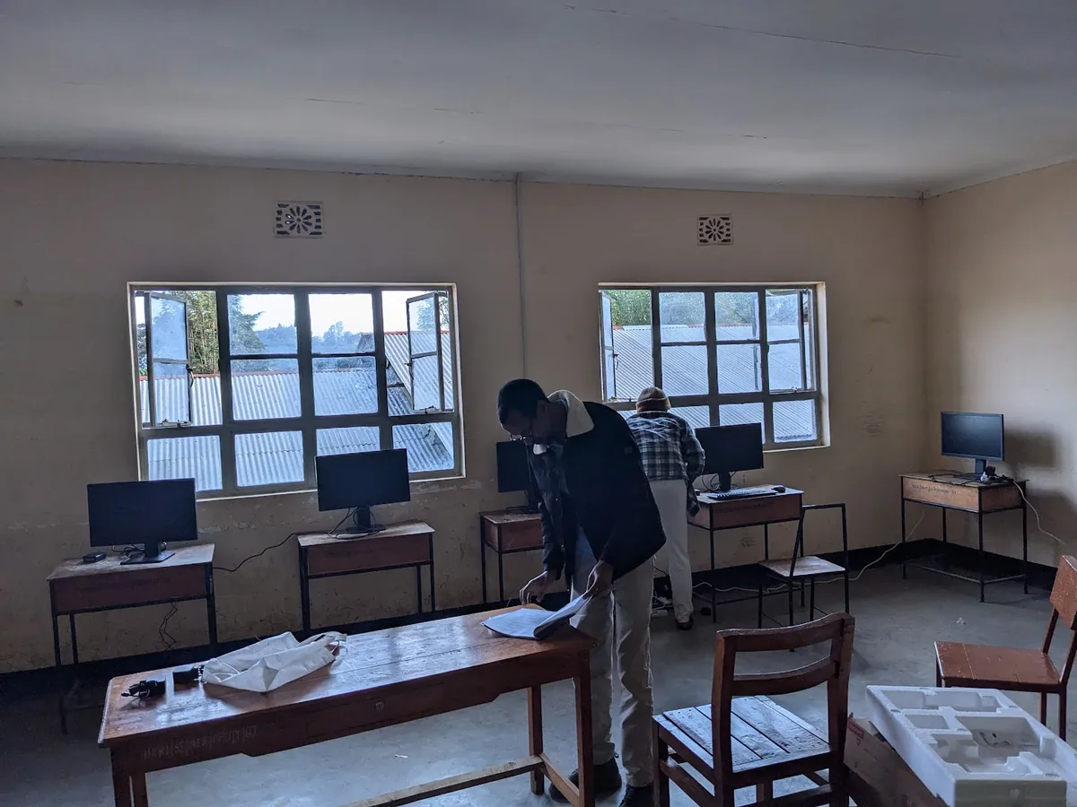 The Nkoarisambu computer room being set up in 2024, monitors on the desks.